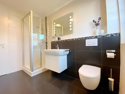 Ein Badezimmer in der Unterkunft Rämel 38 - Wohnung 17