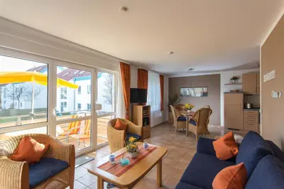 Ein Sitzbereich in der Unterkunft Residenz am Strand Wohnung 1-02