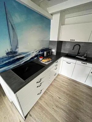 Küche/Küchenzeile in der Unterkunft Residenz am Strand Wohnung 1-21