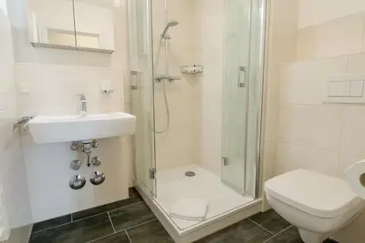 Ein Badezimmer in der Unterkunft Residenz am Strand Wohnung 2-33