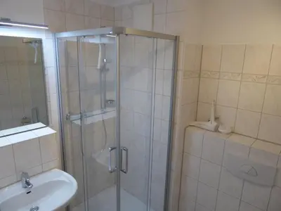 Ein Badezimmer in der Unterkunft Residenz am Strand Wohnung 2-36
