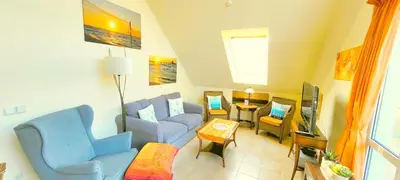 Ein Sitzbereich in der Unterkunft Residenz am Strand Wohnung 2-39