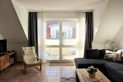 Ein Sitzbereich in der Unterkunft Residenz am Strand Wohnung 2-40