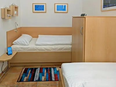 Ein Bett oder Betten in einem Zimmer der Unterkunft Residenz am Strand Wohnung 2-46