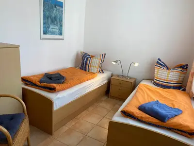 Ein Bett oder Betten in einem Zimmer der Unterkunft Residenz am Strand Wohnung 3-50
