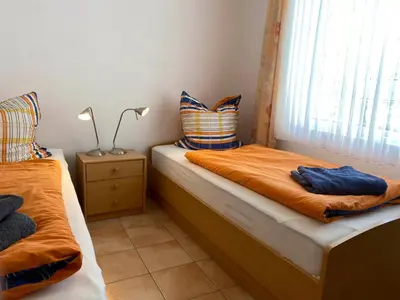 Ein Bett oder Betten in einem Zimmer der Unterkunft Residenz am Strand Wohnung 3-50