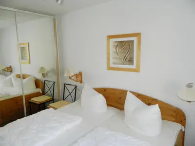 Ein Bett oder Betten in einem Zimmer der Unterkunft Residenz am Strand Wohnung 3-51