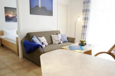 Ein Sitzbereich in der Unterkunft Residenz am Strand Wohnung 4-60