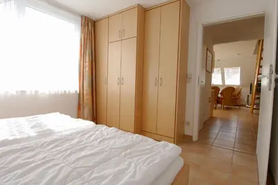Ein Bett oder Betten in einem Zimmer der Unterkunft Residenz am Strand Wohnung 5-71
