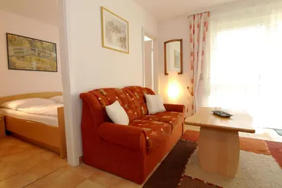 Ein Sitzbereich in der Unterkunft Residenz am Strand Wohnung 6-75