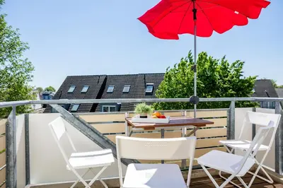 Ein Balkon oder eine Terrasse in der Unterkunft Residenz am Strand Wohnung 6-80