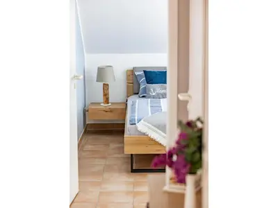 Ein Bett oder Betten in einem Zimmer der Unterkunft Residenz am Strand Wohnung 6-80