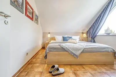 Ein Bett oder Betten in einem Zimmer der Unterkunft Residenz am Strand Seeschwalbe - Wohnung 4-62
