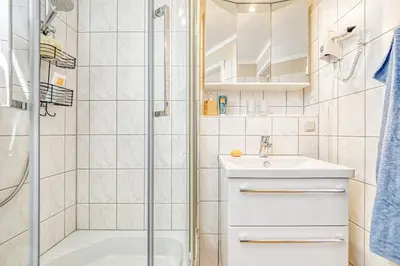 Ein Badezimmer in der Unterkunft Residenz am Strand Seeschwalbe - Wohnung 4-62