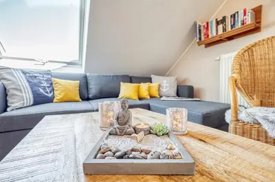 Ein Sitzbereich in der Unterkunft Residenz am Strand Seeschwalbe - Wohnung 4-62