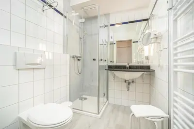 Ein Badezimmer in der Unterkunft Villa Kurpark - Wohnung 512