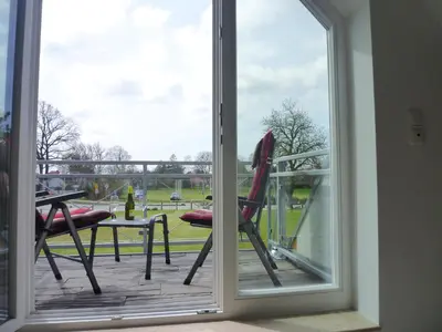Ein Balkon oder eine Terrasse in der Unterkunft Hafenstrasse 15 Wolkenglanz in Prerow
