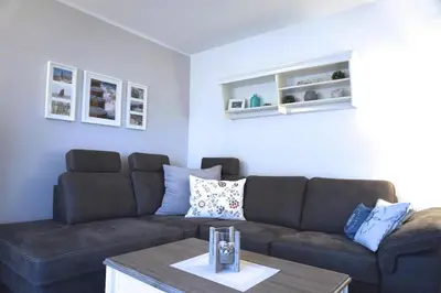 Ein Sitzbereich in der Unterkunft Zur Hanse Wohnung 1 4