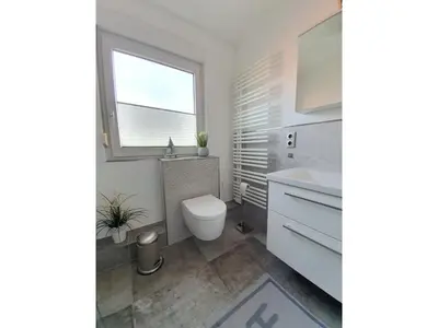Ein Badezimmer in der Unterkunft Zur Hanse Wohnung 1 4