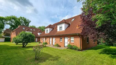 Ein Garten an der Unterkunft Zur Hanse Wohnung 2 4