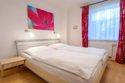 Ein Bett oder Betten in einem Zimmer der Unterkunft Zur Hanse Wohnung 4 1