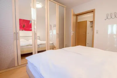 Ein Bett oder Betten in einem Zimmer der Unterkunft Zur Hanse Wohnung 4 1