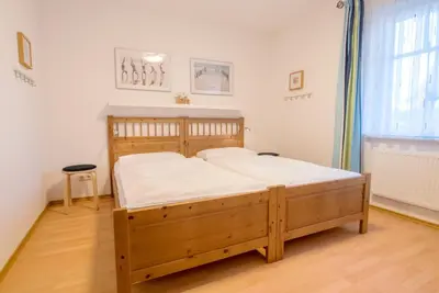 Ein Bett oder Betten in einem Zimmer der Unterkunft Zur Hanse Wohnung 4 1