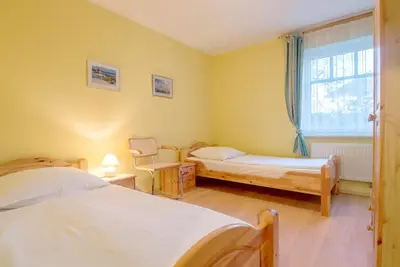 Ein Bett oder Betten in einem Zimmer der Unterkunft Zur Hanse Wohnung 4 2