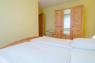 Ein Bett oder Betten in einem Zimmer der Unterkunft Zur Hanse Wohnung 4 2