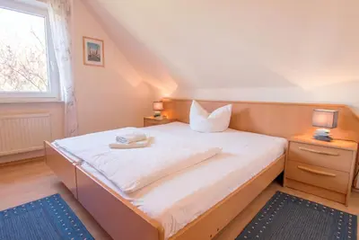 Ein Bett oder Betten in einem Zimmer der Unterkunft Zur Hanse Wohnung 2 3 - Zur Hanse Nord