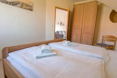 Ein Bett oder Betten in einem Zimmer der Unterkunft Zur Hanse Wohnung 2 3 - Zur Hanse Nord
