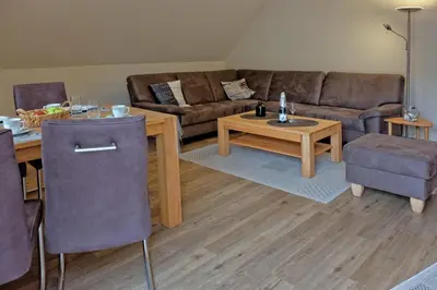 Ein Sitzbereich in der Unterkunft Zur Hanse Wohnung 4 5 - Zur Hanse West