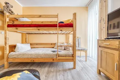 Ein Bett oder Betten in einem Zimmer der Unterkunft Parkresidenz am Hafen Wohnung HF 34