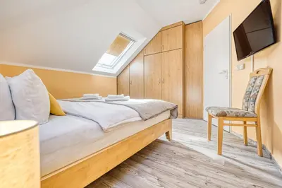 Ein Bett oder Betten in einem Zimmer der Unterkunft Parkresidenz am Hafen Wohnung HF 34