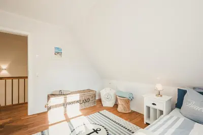 Ein Bett oder Betten in einem Zimmer der Unterkunft Pinne
