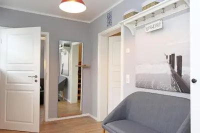 Ein Bett oder Betten in einem Zimmer der Unterkunft Optimist