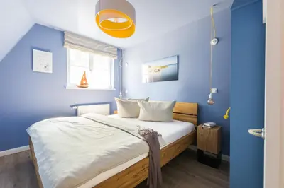 Ein Bett oder Betten in einem Zimmer der Unterkunft 8 kleine Heringe