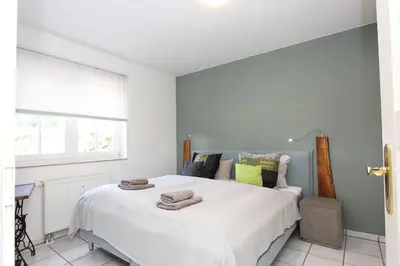 Ein Bett oder Betten in einem Zimmer der Unterkunft Horizont