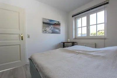 Ein Bett oder Betten in einem Zimmer der Unterkunft Horizont