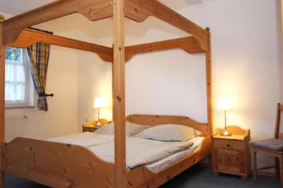 Ein Bett oder Betten in einem Zimmer der Unterkunft 2 Weidenhof