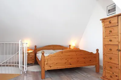 Ein Bett oder Betten in einem Zimmer der Unterkunft 6 Weidenhof