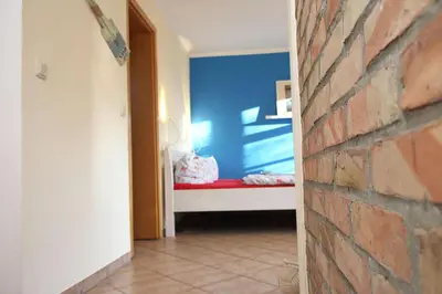 Ein Bett oder Betten in einem Zimmer der Unterkunft Achtern-Stems 3