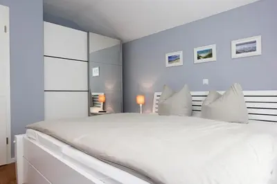 Ein Bett oder Betten in einem Zimmer der Unterkunft Blauwasser Luv