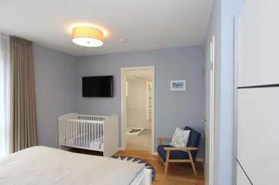 Ein Bett oder Betten in einem Zimmer der Unterkunft Blauwasser Luv