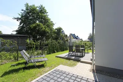 Ein Garten an der Unterkunft Blauwasser Lee
