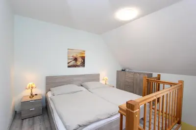 Ein Bett oder Betten in einem Zimmer der Unterkunft Oliver-Grolik