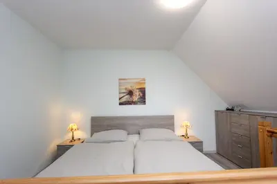 Ein Bett oder Betten in einem Zimmer der Unterkunft Oliver-Grolik