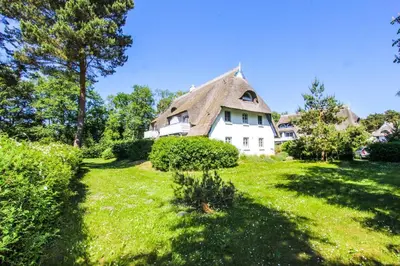 Ein Garten an der Unterkunft Strandmuschel