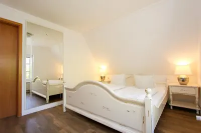 Ein Bett oder Betten in einem Zimmer der Unterkunft Lieblingshaus Rosalie