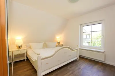 Ein Bett oder Betten in einem Zimmer der Unterkunft Lieblingshaus Rosalie